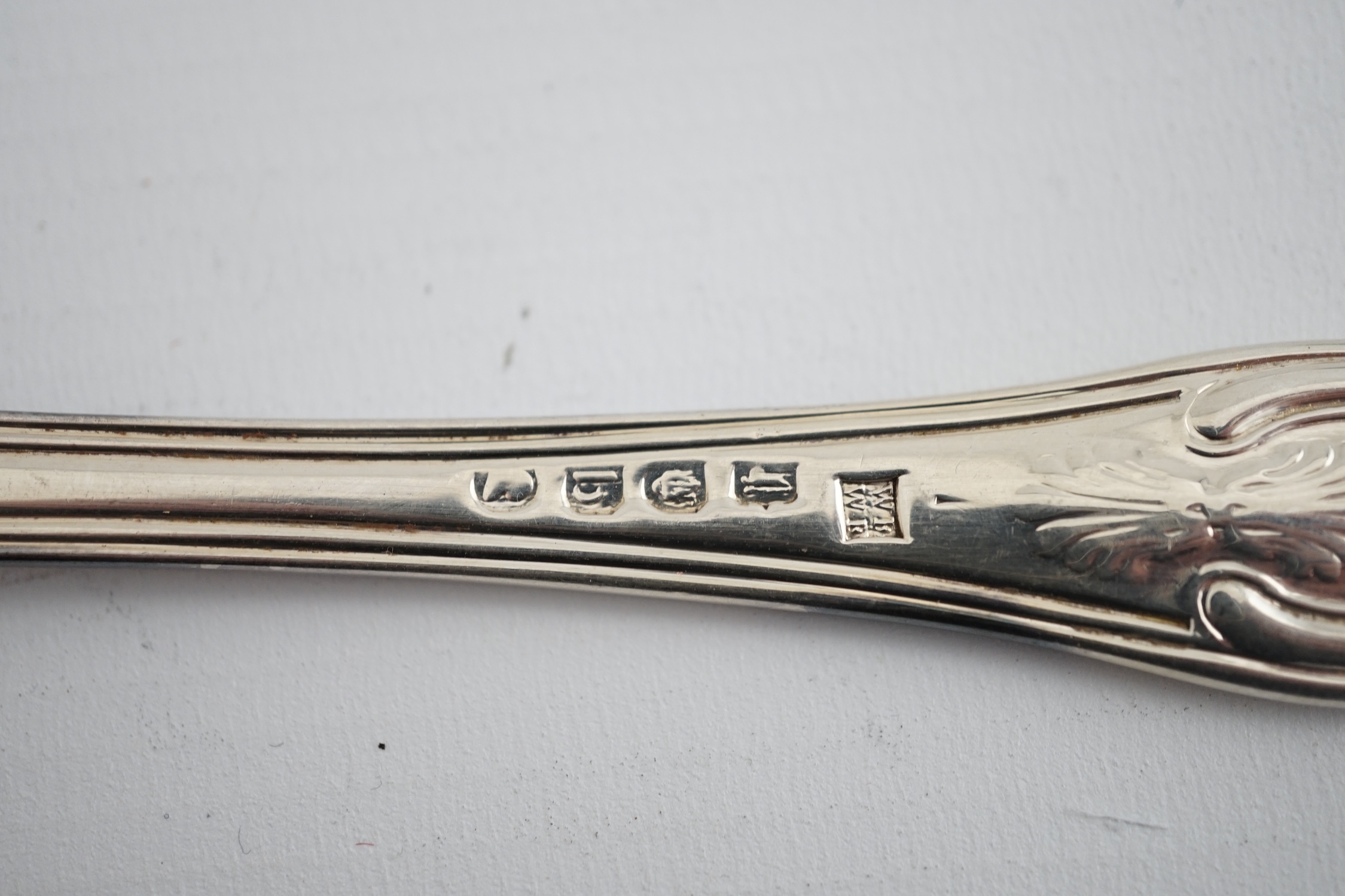 A harlequin set of six Georgian and Victorian silver Kings pattern table spoons, various dates and makers